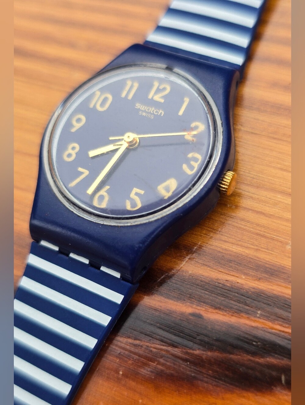 Swatch Ora D'Aria Navy and White Striped Silicone Watch with Gold Accents